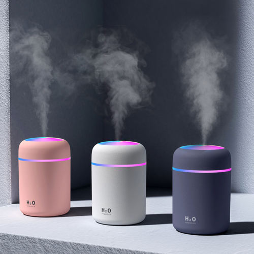 Humidificador de aire portátil con difusor de aceites esenciales para coche y hogar.